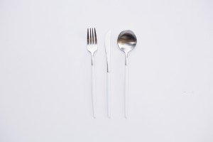white and silver cutlery hire